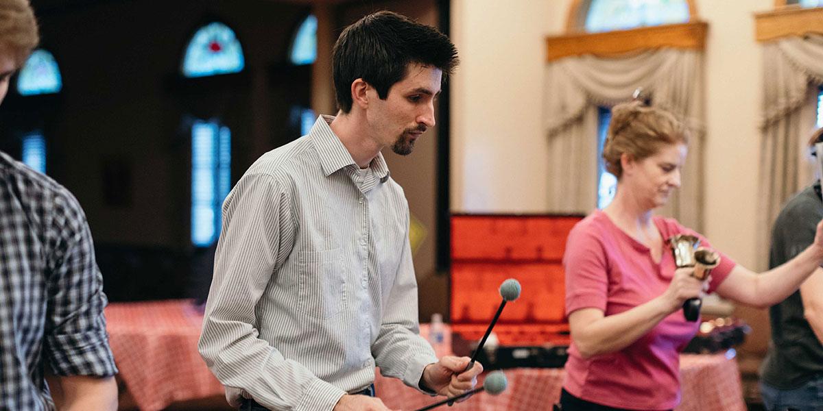 Alex playing handbells